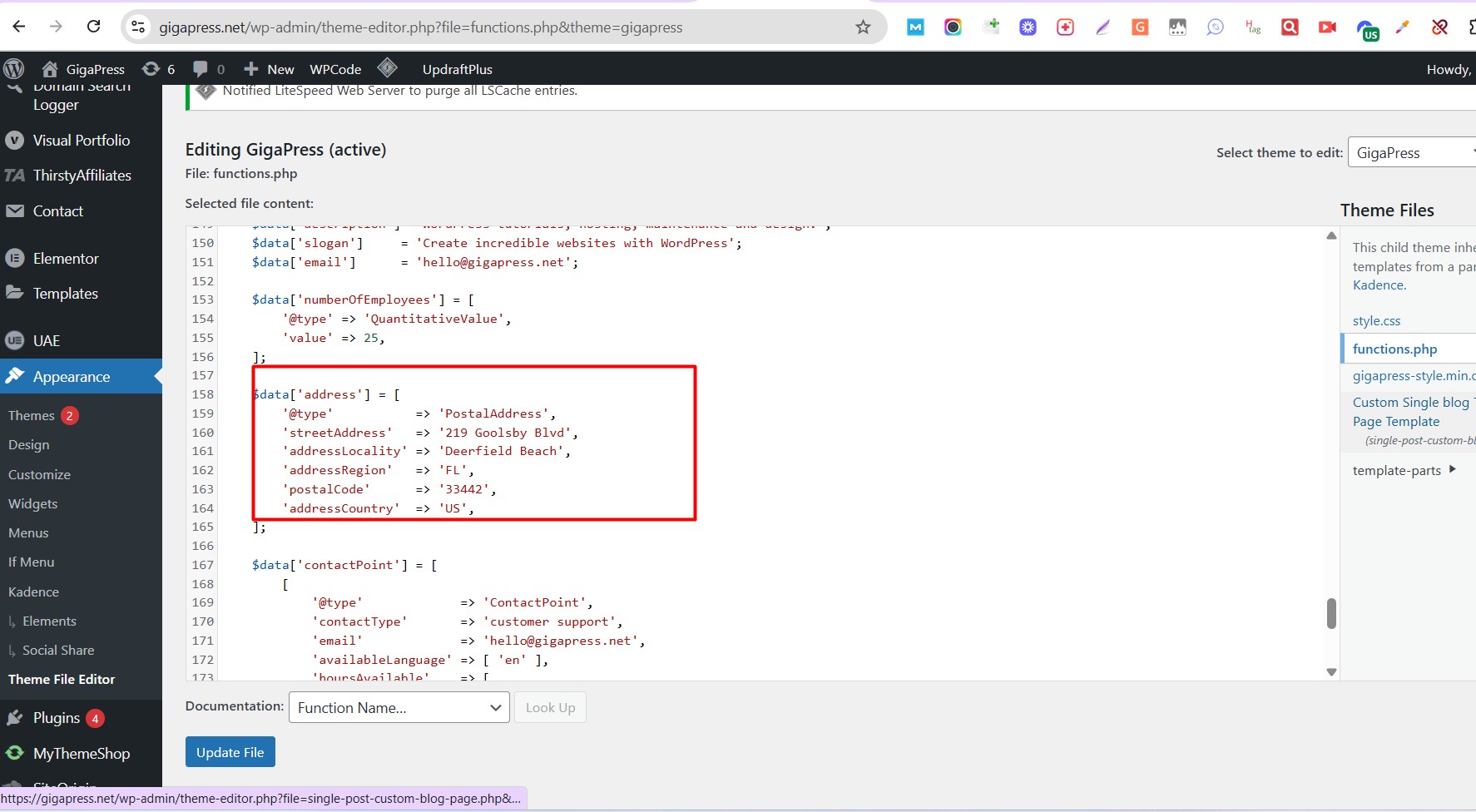 Structured data generated in a website theme file, building a PostalAddress and contact point from the site data.